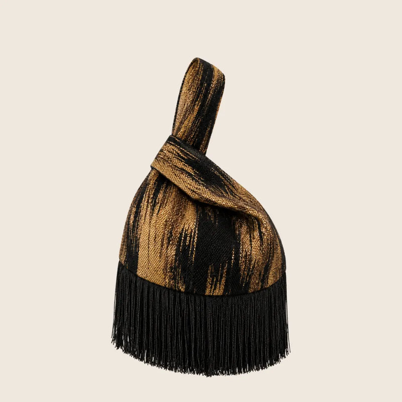 Japanese Knot Bag en tejido negro y dorado con flecos negros